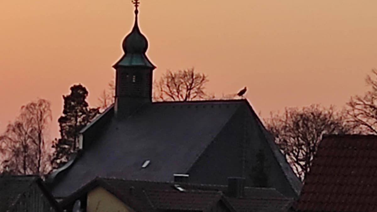 Sonnenuntergang bei St.-Moritz-Kirche