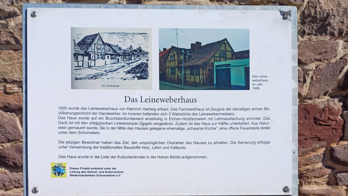 Schild vom HKV vor dem Haus